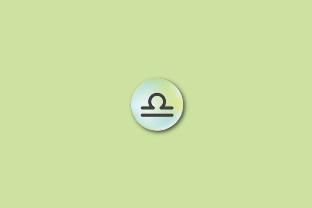 Ilustração do signo de libra, em um círculo com as cores verde, azul e amarelo, sobre um fundo verde