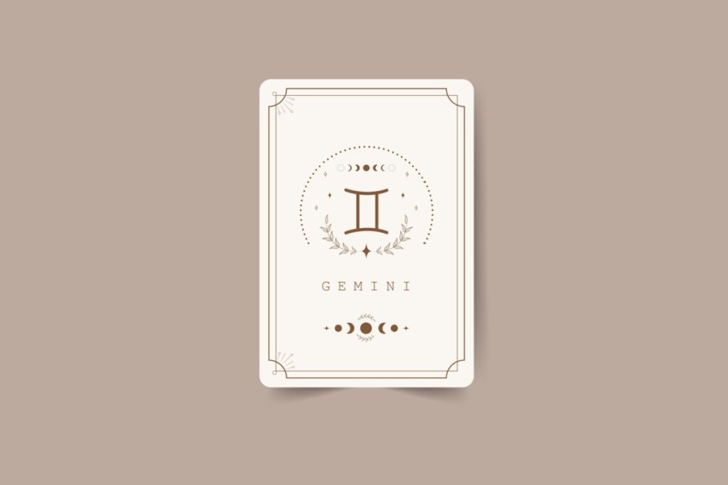 ilustração de uma carta branca com símbolo do signo de gêmeos marrom com pontos em volta, nome do signo em inglês embaixo e desenhos de lua. carta está em fundo marrom-claro