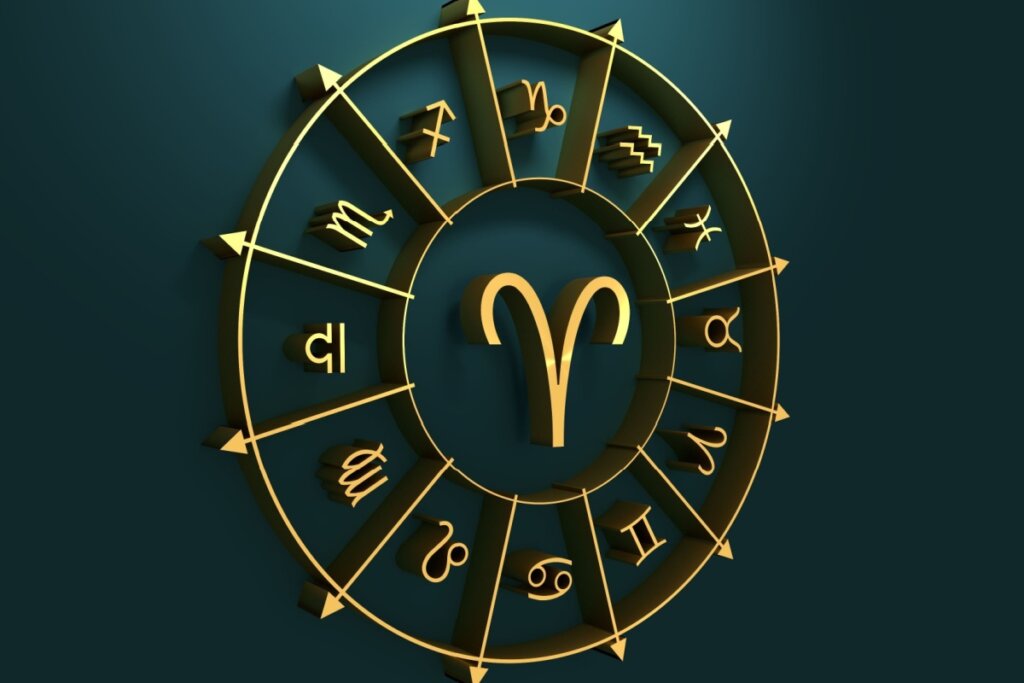 círculo em amarelo com símbolo dos 12 signos em volta, separados por flechas, com símbolo do signo de áries no centro, sobre fundo verde-escuro