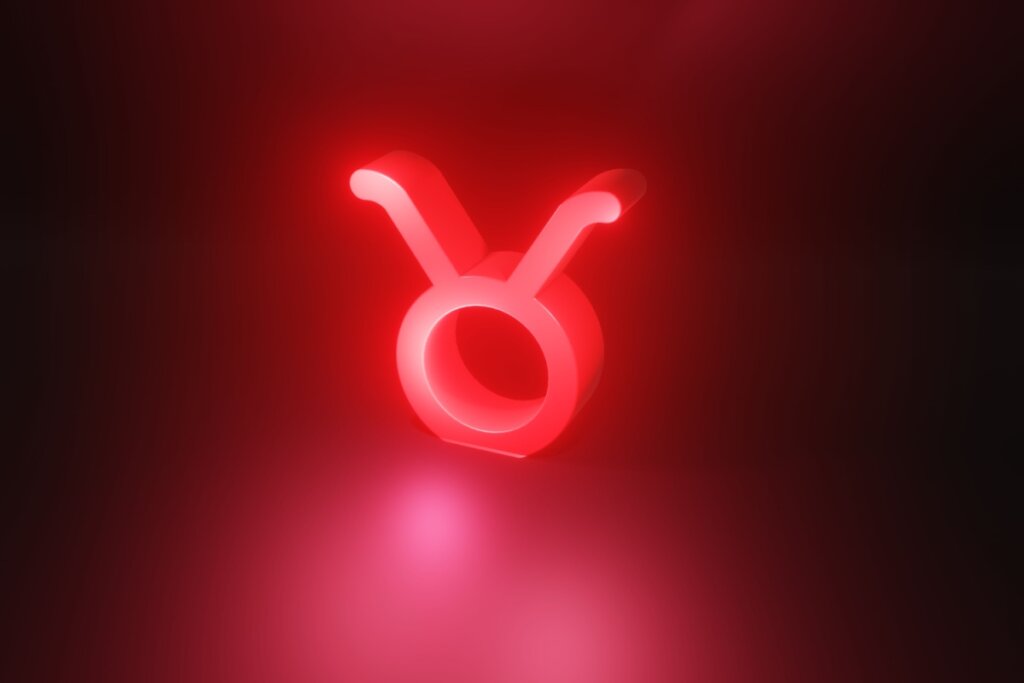 Ilustração em vermelho neon do símbolo do signo de Touro em fundo vemelho escuro