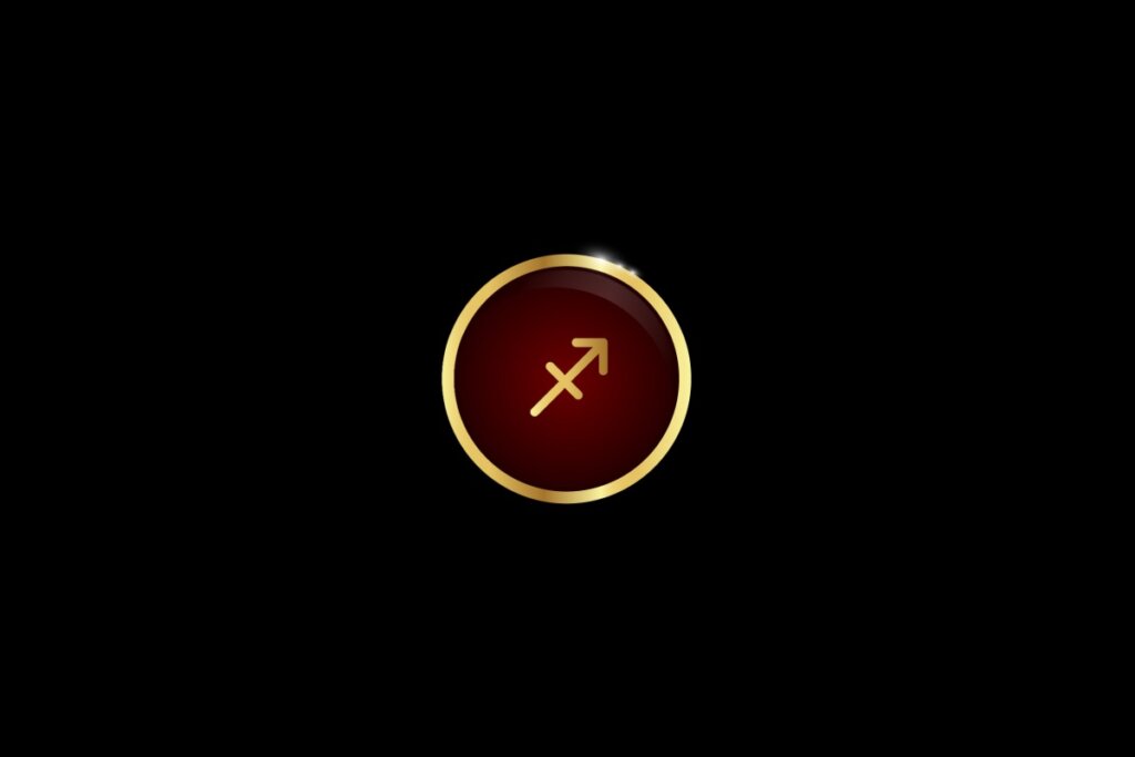 Ilustração do signo de sagitário dentro de um círculo dourado, iluminado com uma luz vermelha, em um fundo preto