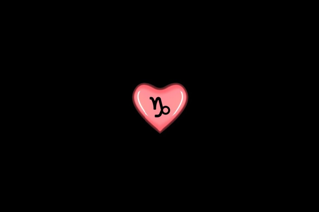 Ilustração de um coração rosa, com o símbolo do signo de capricórnio dentro, centralizado em um fundo preto