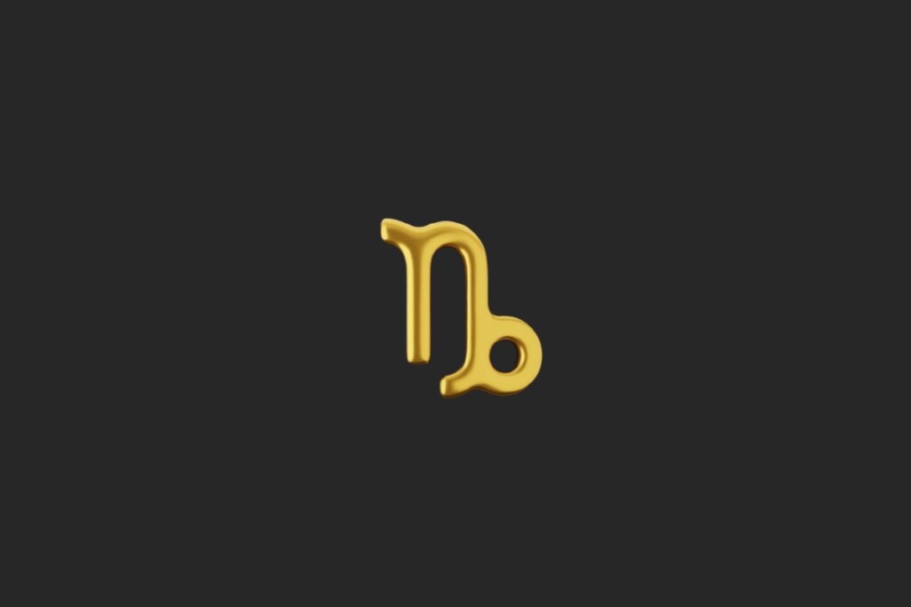 Ilustração do signo de Capricórnio em dourado em fundo preto