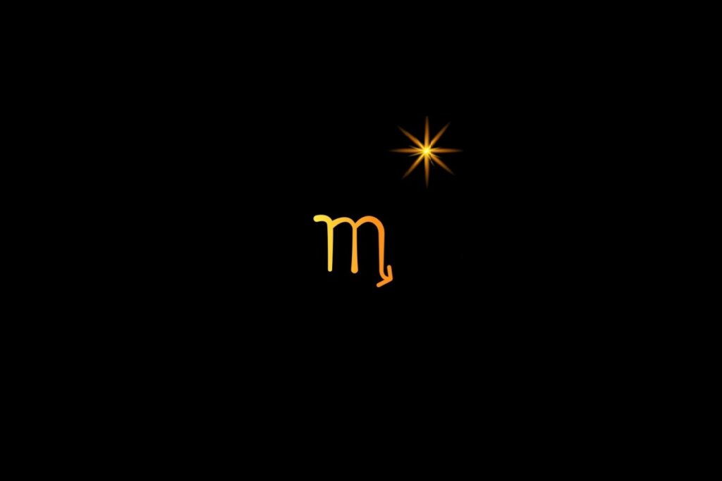 Ilustração do signo de escorpião em amarelo em um fundo preto, com uma estrela do lado direito superior