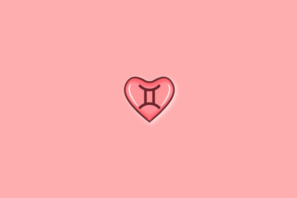 Coração em fundo vermelho-claro com o símbolo do signo de gêmeos dentro