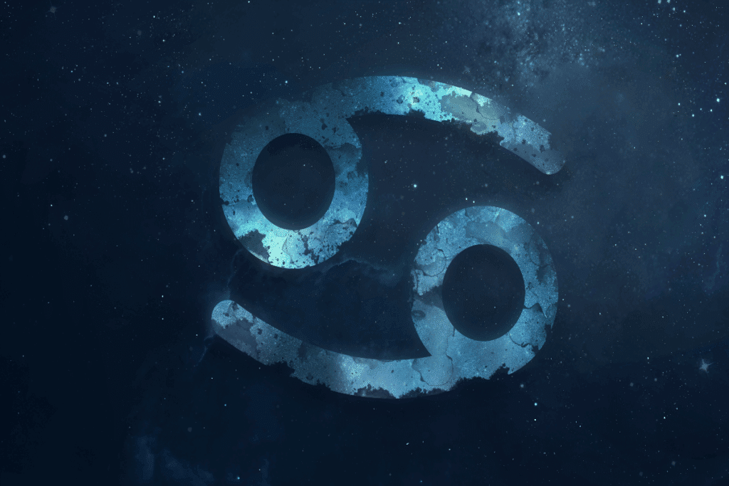 A imagem mostra o símbolo do signo de câncer em destaque sobre um fundo que representa o espaço, repleto de estrelas e nebulosas. O ícone aparece em tons de azul, com textura que se mistura ao cenário cósmico.
