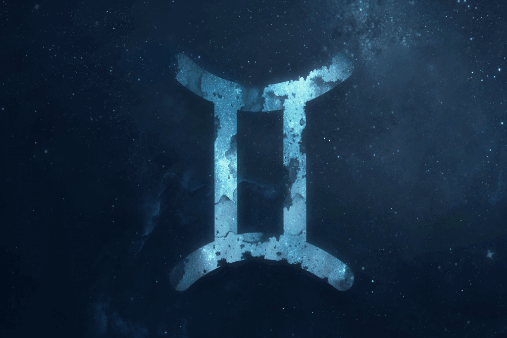 A imagem mostra o símbolo do signo de aquário em destaque sobre um fundo que representa o espaço, repleto de estrelas e nebulosas. O ícone aparece em tons de azul, com textura que se mistura ao cenário cósmico.